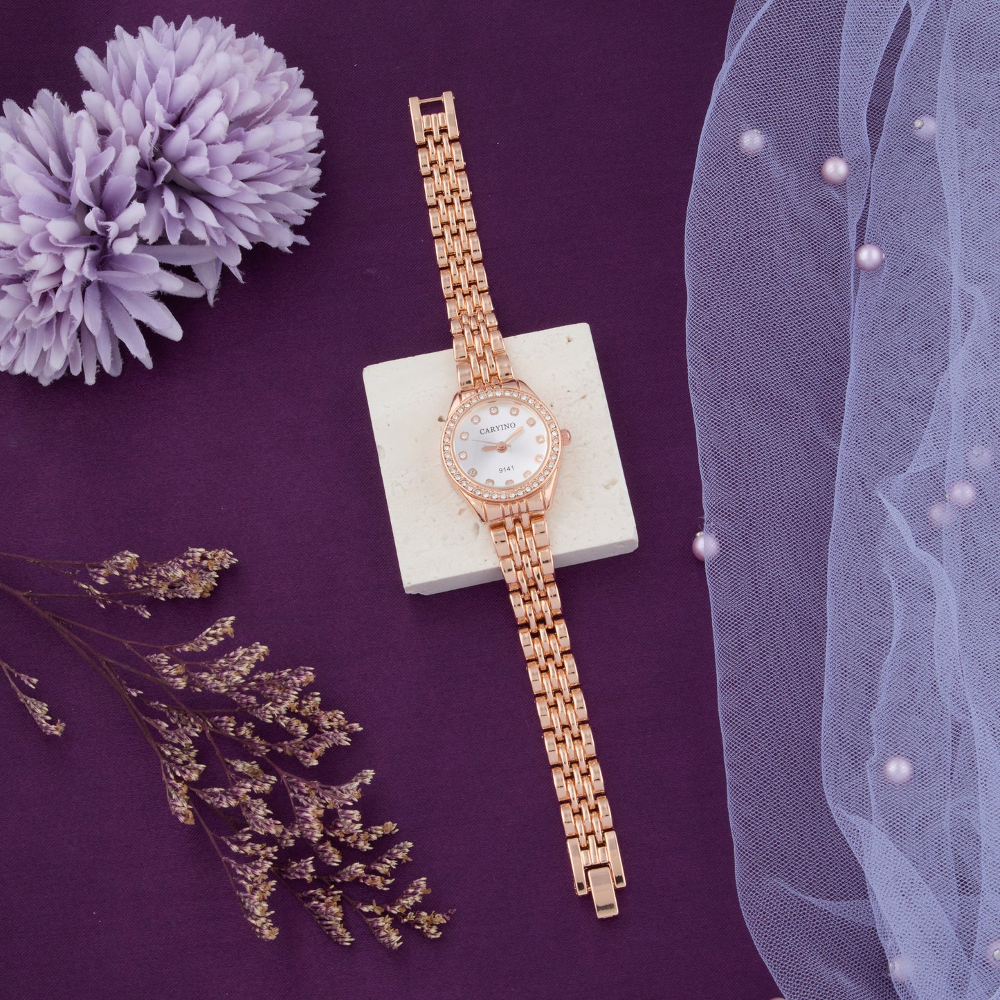 Elegant Rose Gold Round Dial Women's Watch with Crystal Accents