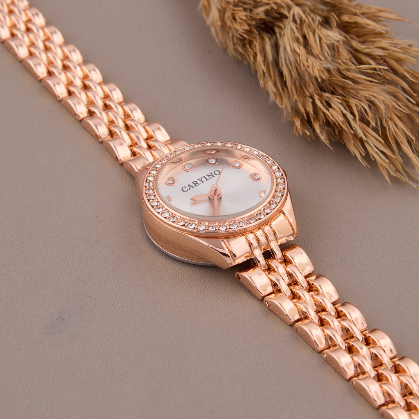 Elegant Rose Gold Round Dial Women's Watch with Crystal Accents