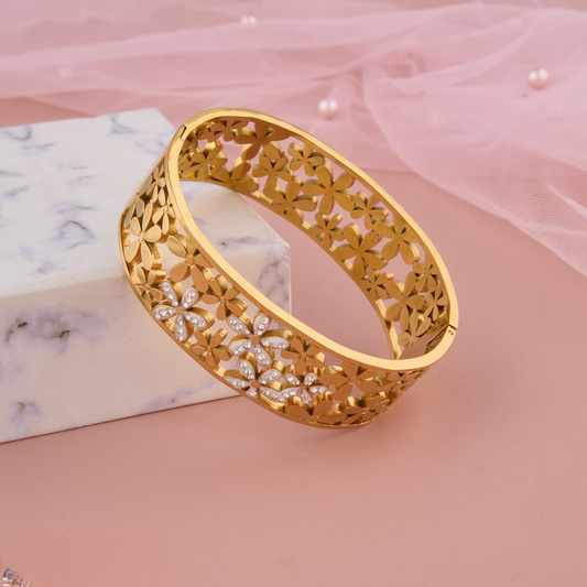 Gold Floral Cut-Out Bangle with Gemstone Detailing