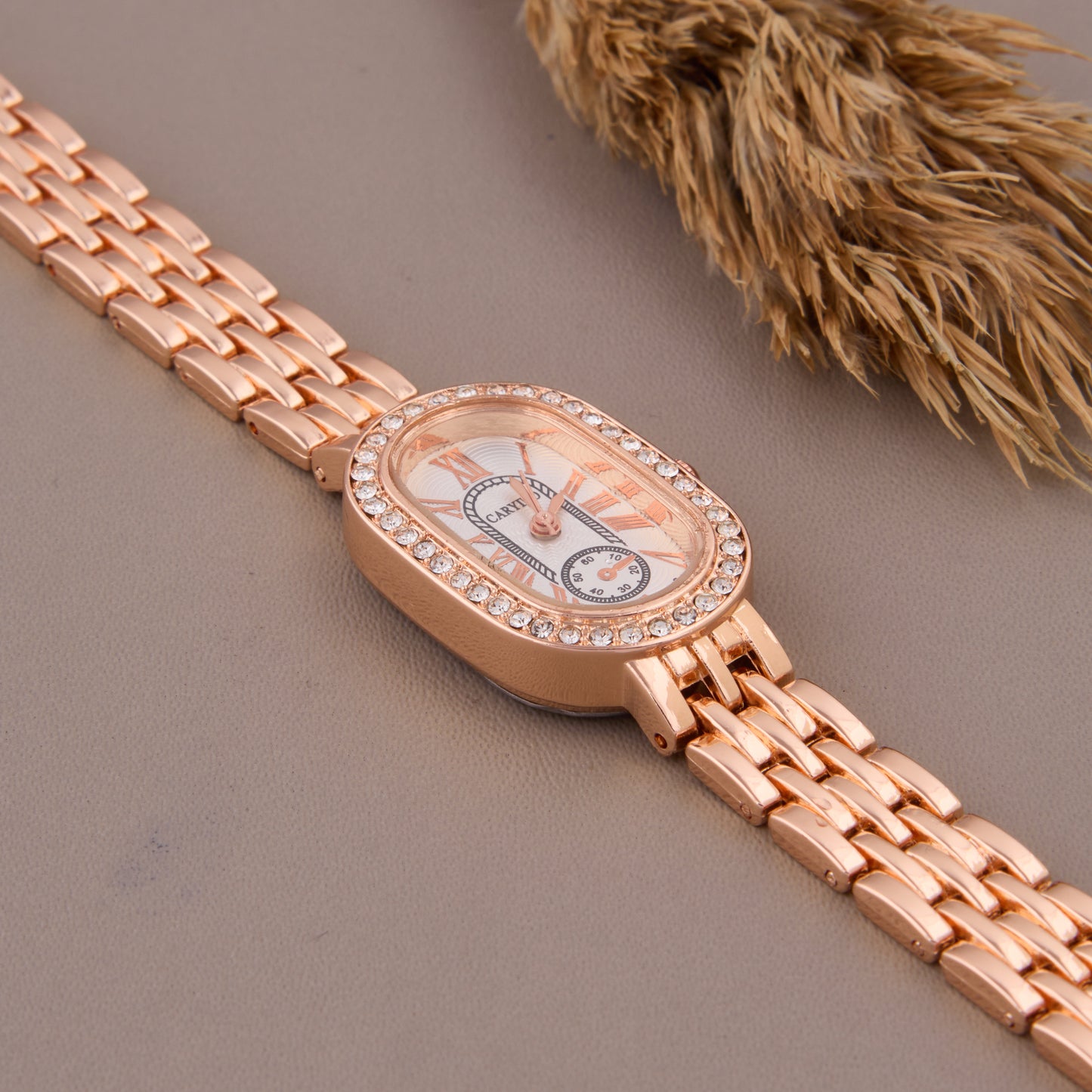 Elegant Rose Gold Oval Dial Women’s Watch with Crystal Bezel & Roman Numerals