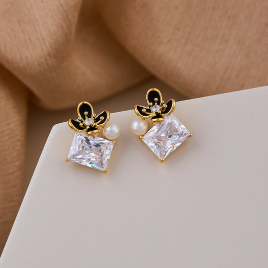 Gold Butterfly Design Earrings with Pearl and Rectangular Crystal
