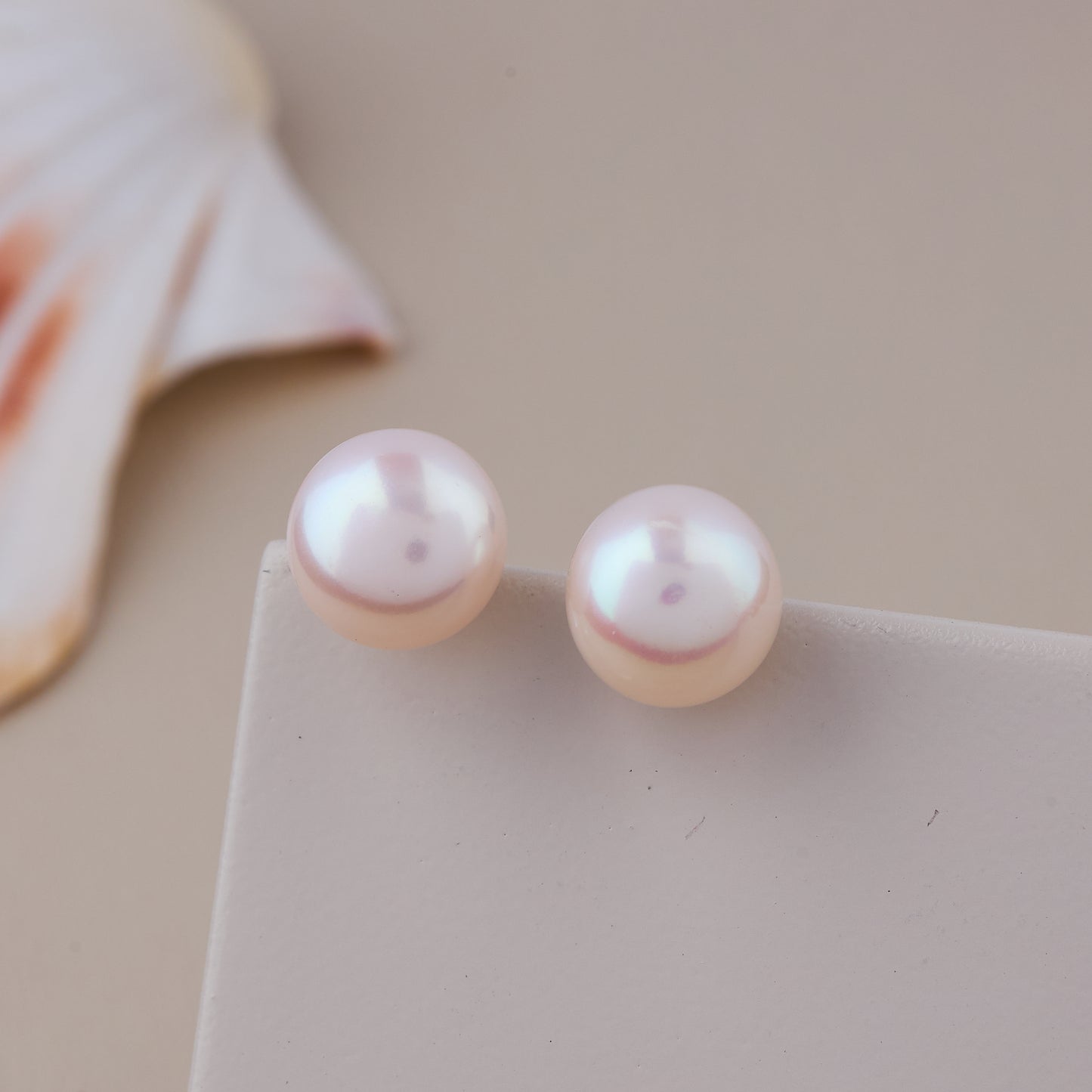 Classic Round Pearl Stud Earrings with a Soft Pink Luster