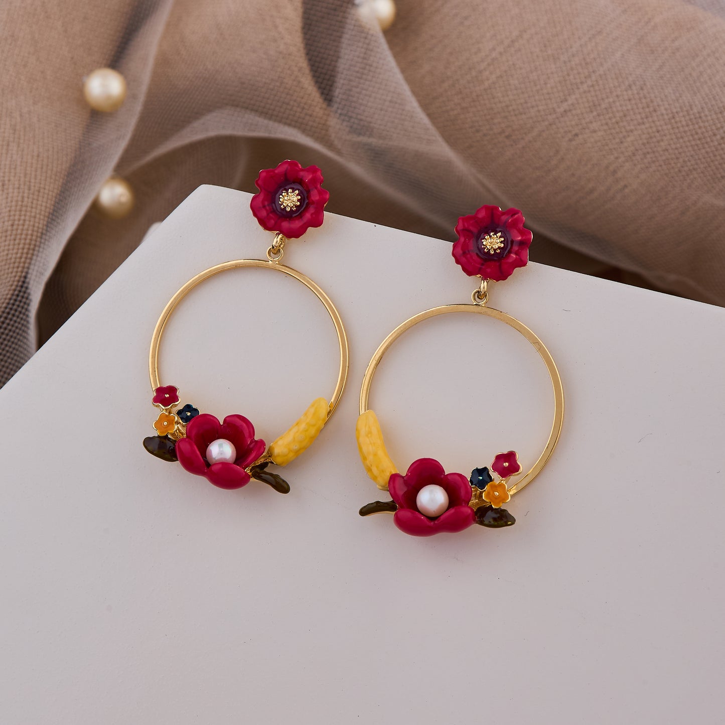 Gold Hoop Earrings with Red Floral Accents, Pearls, and Yellow Detailing