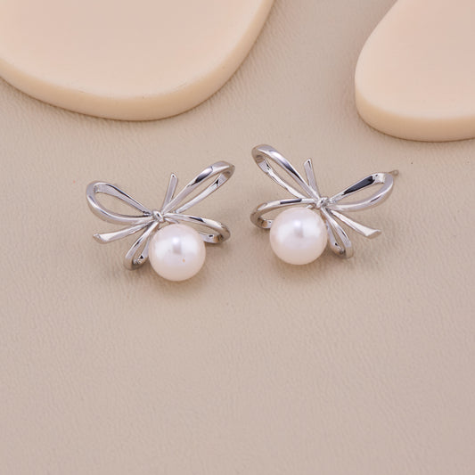 Unique Silver Bow Pearl Earrings
