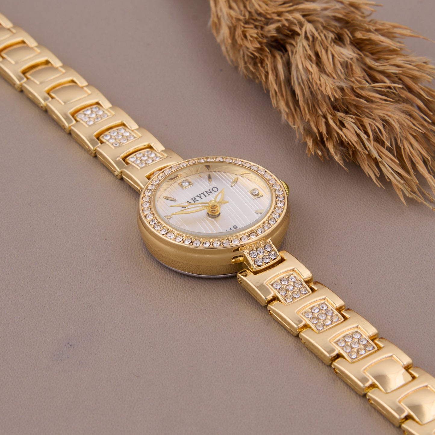 Elegant Gold Women’s Watch with Crystal-Studded Dial & Bracelet