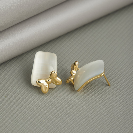 Gold Bow Earrings in Silver