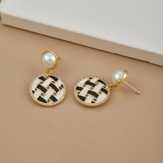 Artistic Enamel Earrings on Tan Display