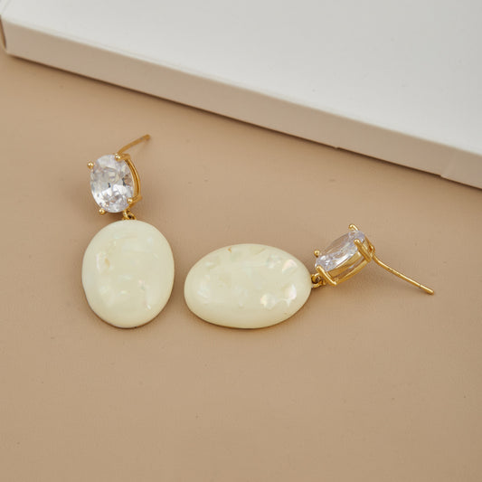 Elegant Gold Earrings with White Stone