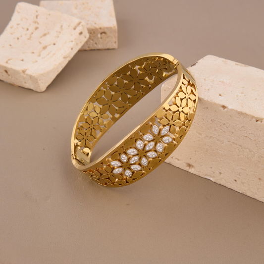 Elegant Gold Floral Cut-Out Bangle with Stone Embellishments