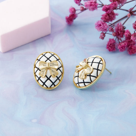 Bow-Design Earrings with Gemstones and Enamel Detailing