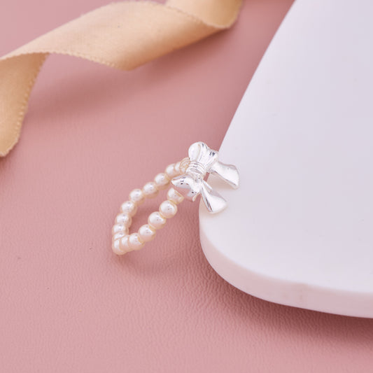 Silver Bow Design Ring with Pearl Beaded Band