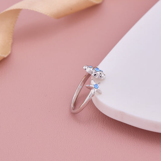 Silver Starfish and Seashell Ring with Blue Crystals