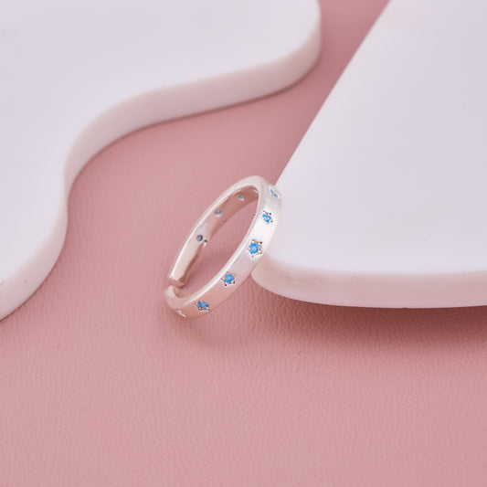 Silver Adjustable Band Ring with Blue Star Accents