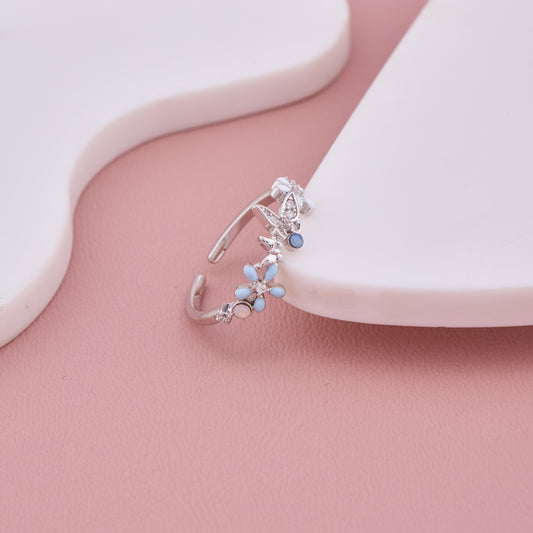 Silver Butterfly and Flower Adjustable Ring with Blue and White Enamel Detailing