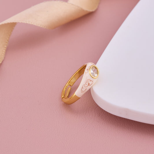 Gold-Plated Enamel Ring with Intricate Floral Engraving and Oval Crystal Centerpiece