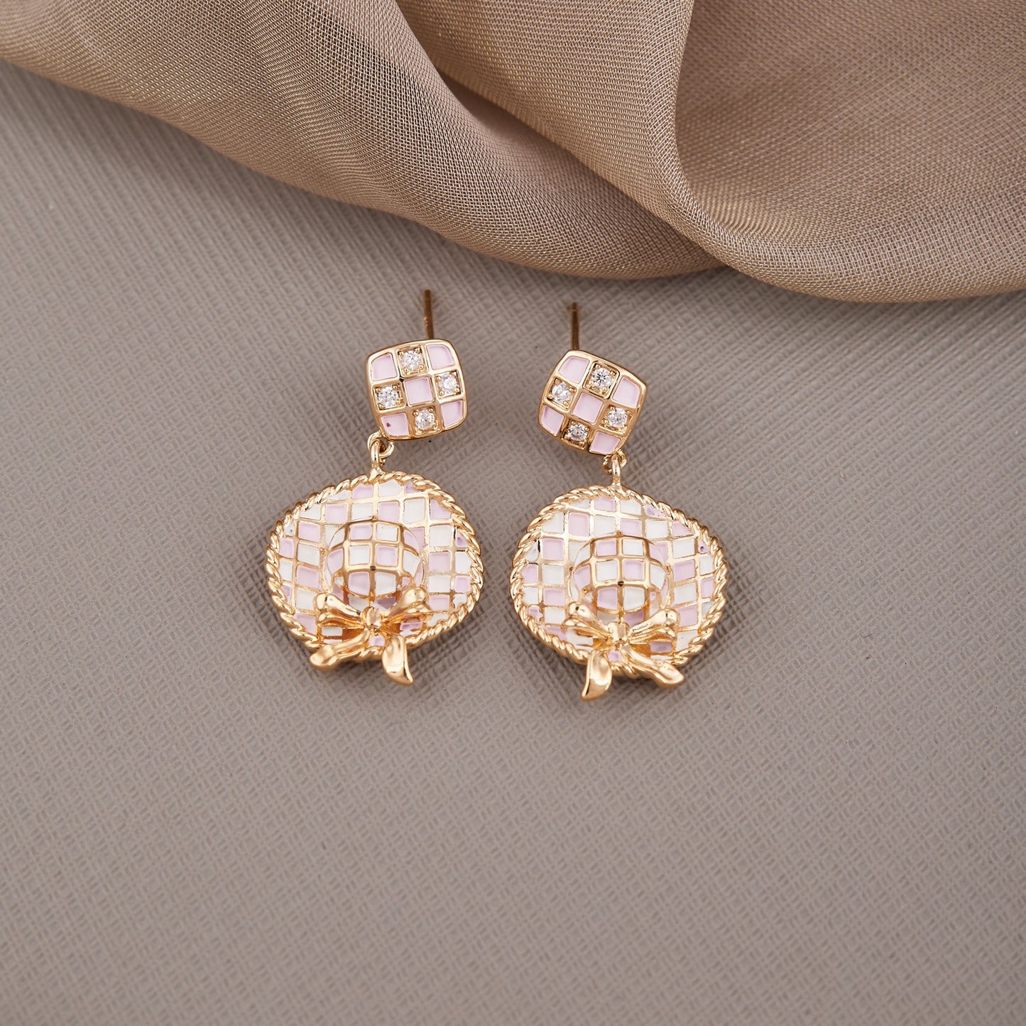 Baby Pink Exquisitely Crafted Earrings Showcasing Intricate Design
