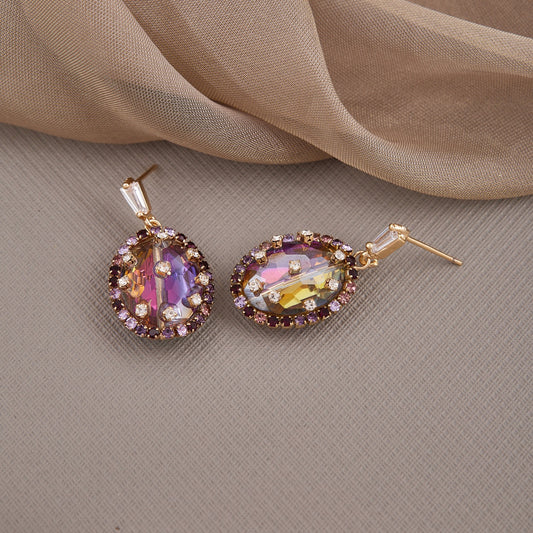 Elegant Gemstone Earrings with Intricate Detailing