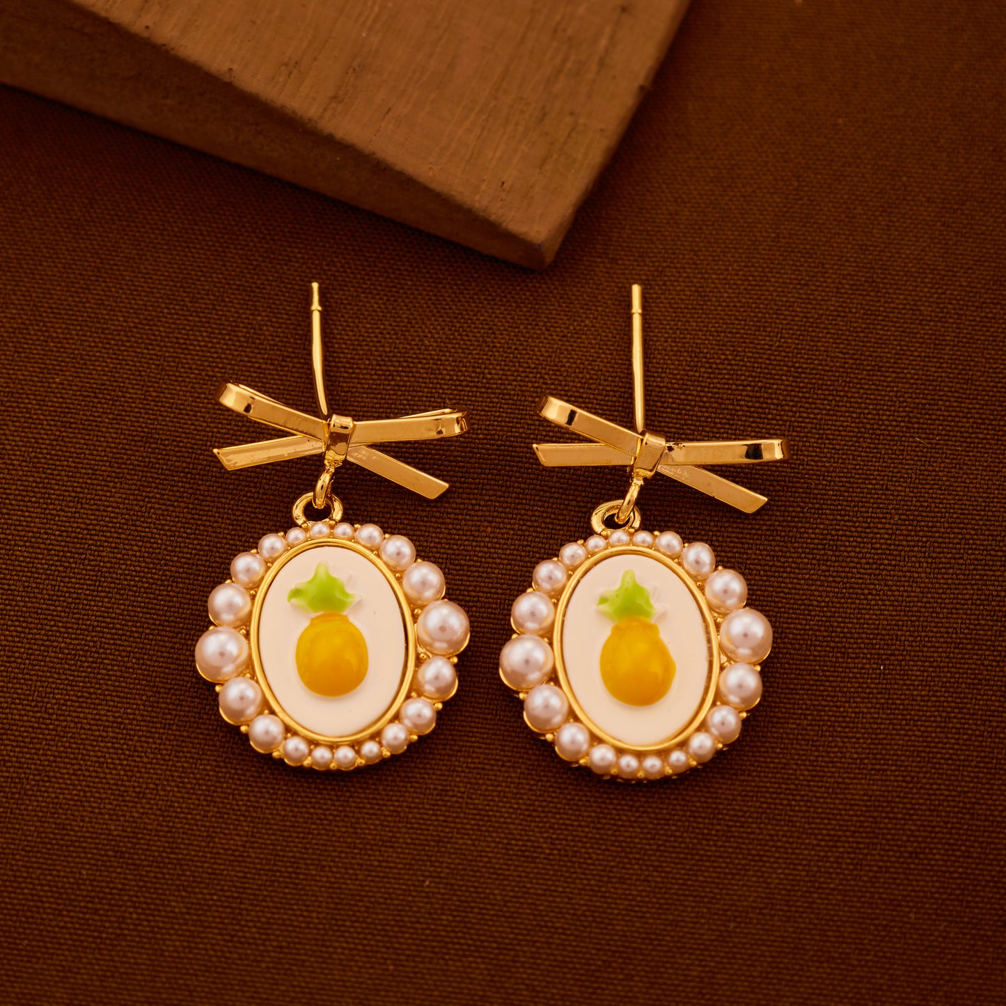 Pineapple Pearl Drop Earrings with Bow Accent
