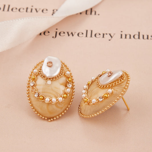 Beige Oval Stud Earrings with Pearl and Gold Bead Detailing