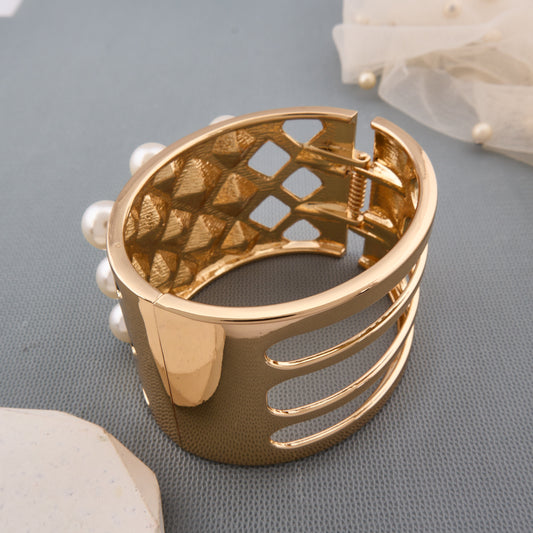 Gold-Tone Statement Bracelet with Pearl Embellishments
