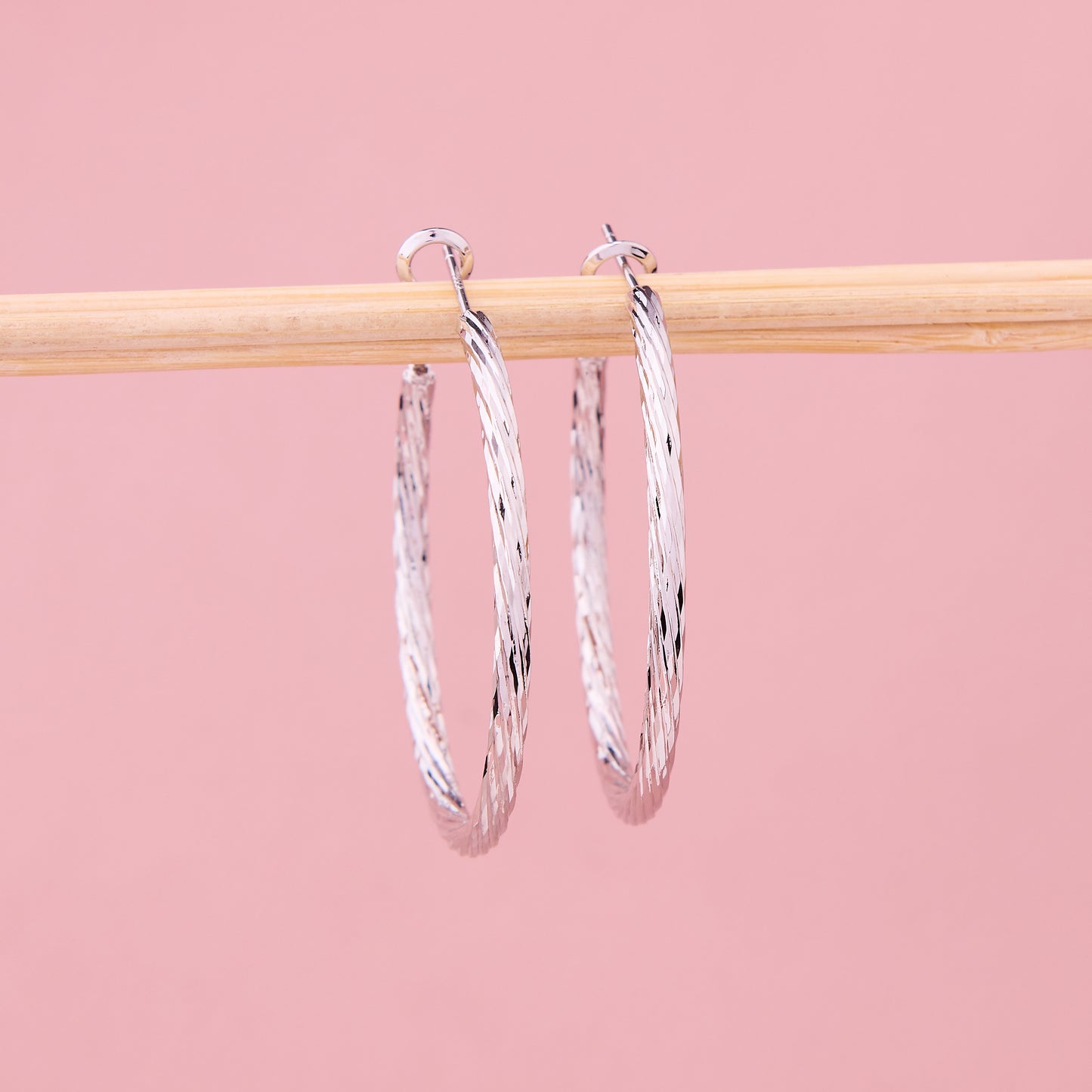 Radiant Diamond-Cut Silver Hoops