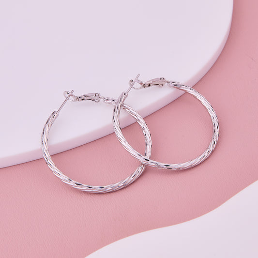 Radiant Diamond-Cut Silver Hoops
