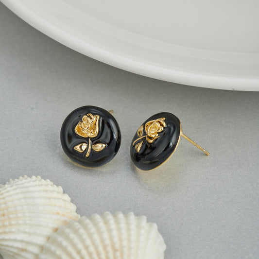 Black Earrings with Intricate Gold Floral Design Striking Elegance