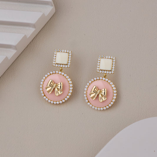Pink and White Pearl Bow Drop Earrings with Gold Accents
