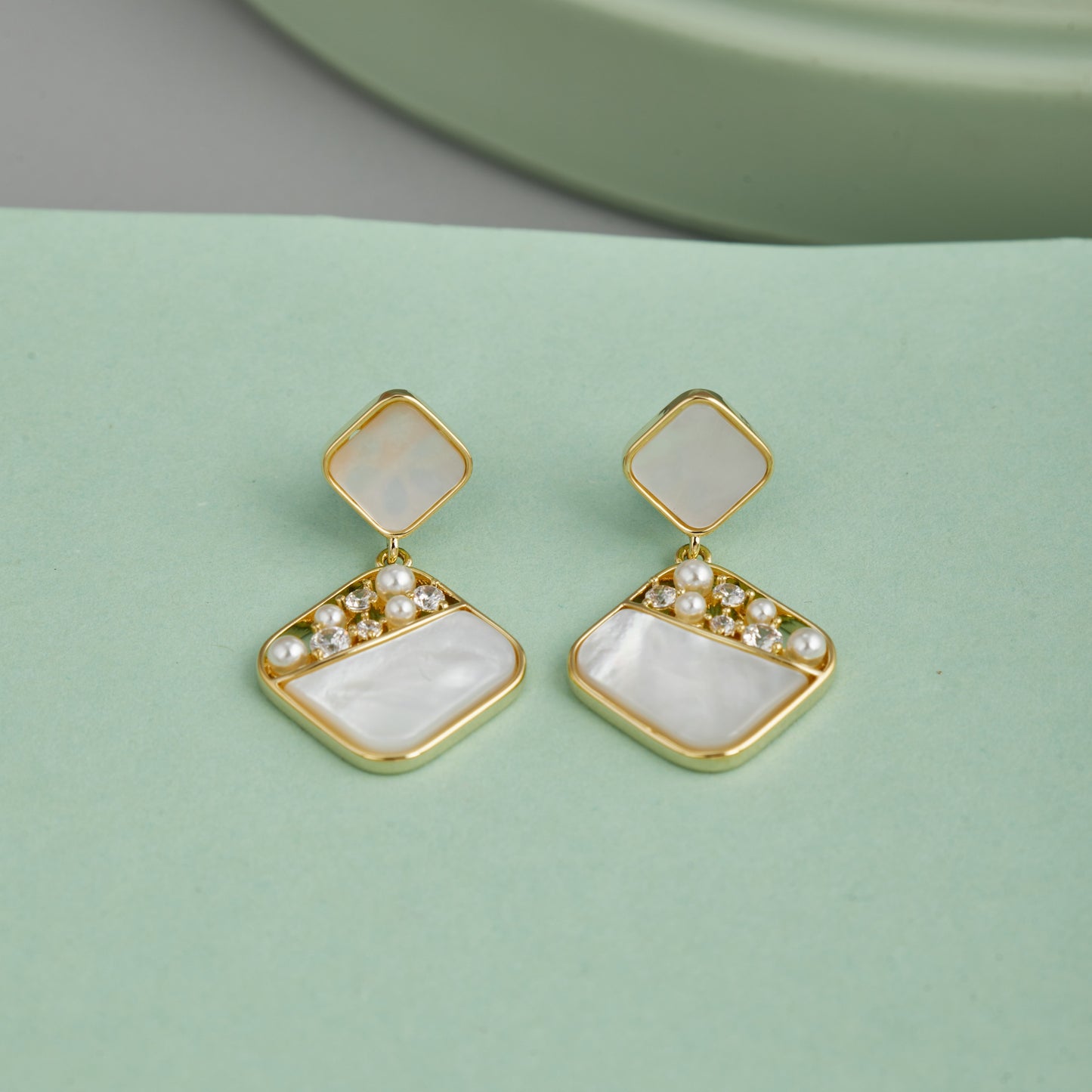 Enamel Earrings Intricate & Elegant on Green Display