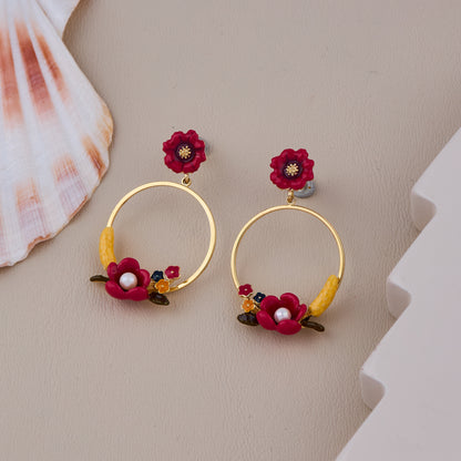 Gold Hoop Earrings with Red Floral Accents, Pearls, and Yellow Detailing