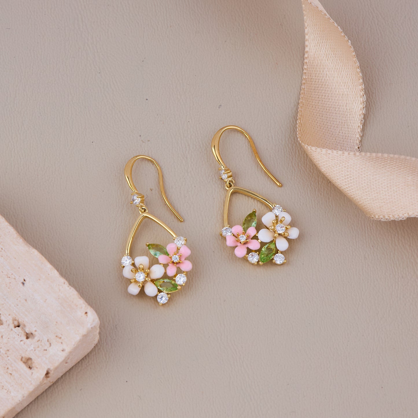 Gold Hook Earrings with White and Pink Flowers, Green Leaf Accents, and Crystal Detailing