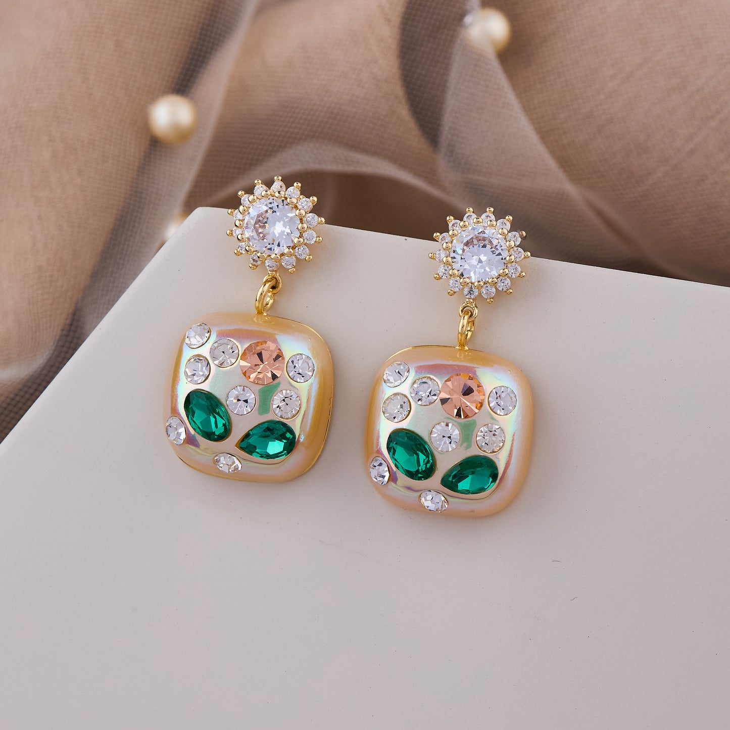 Gold square drops with emerald & crystal accents