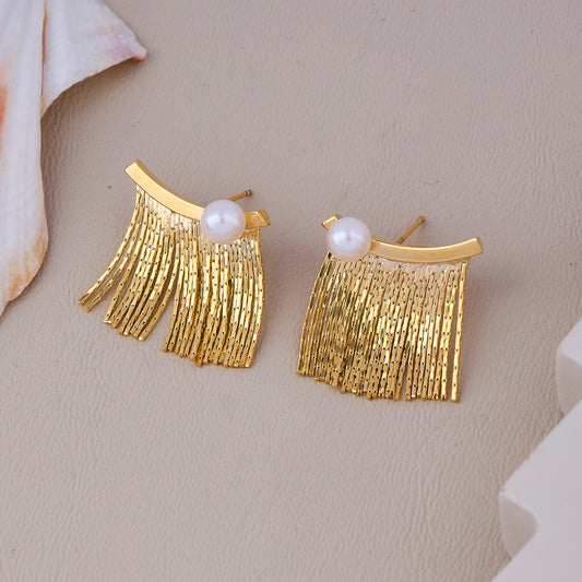 Golden fringe studs with pearl tops