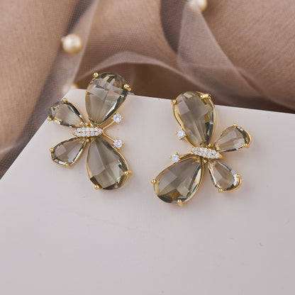 Chic butterfly earrings with smoky crystal wings