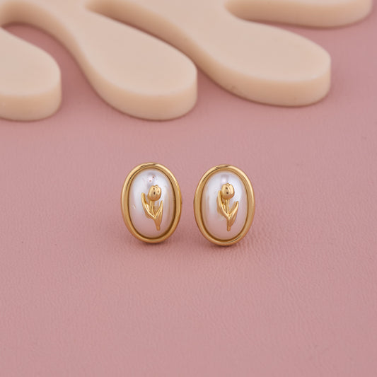 Elegant Oval Pearl Stud Earrings with Golden Floral Motif