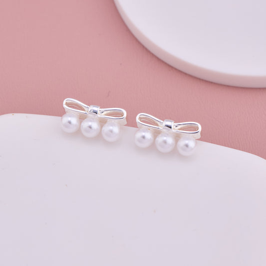 Silver Bow Pearl Stud Earrings
