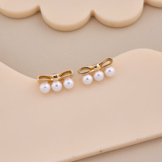 Pearl Bow Elegance Studs