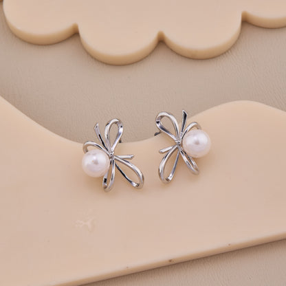 Unique Silver Bow Pearl Earrings