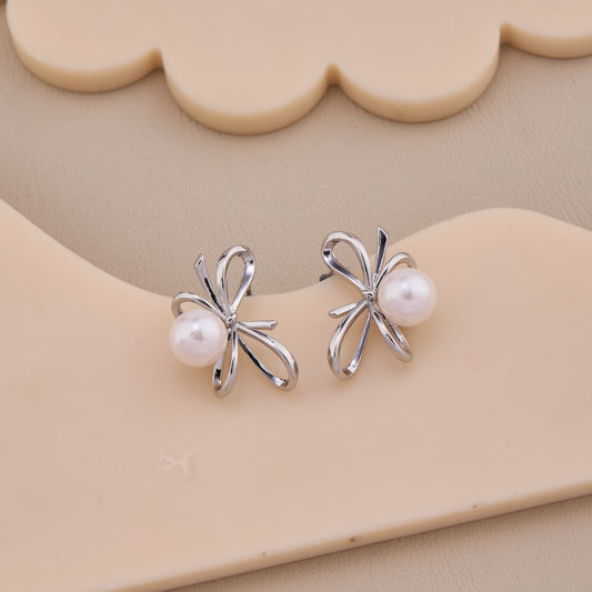 Unique Silver Bow Pearl Earrings