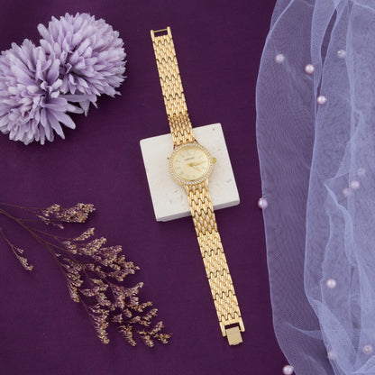 Classic Gold Women's Watch with Roman Numerals & Crystal Bezel