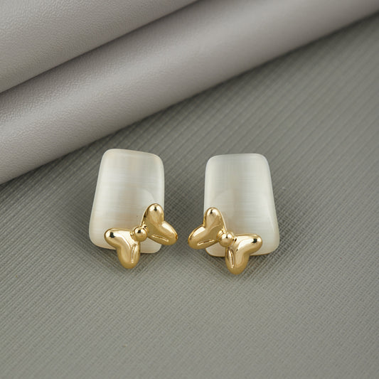 Gold Bow Earrings in Silver