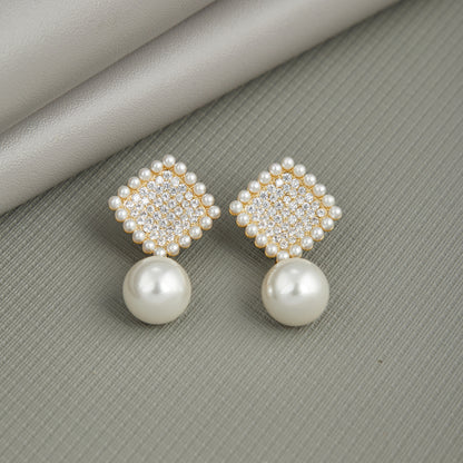 Elegant Silver Earrings with Pearls and Diamonds