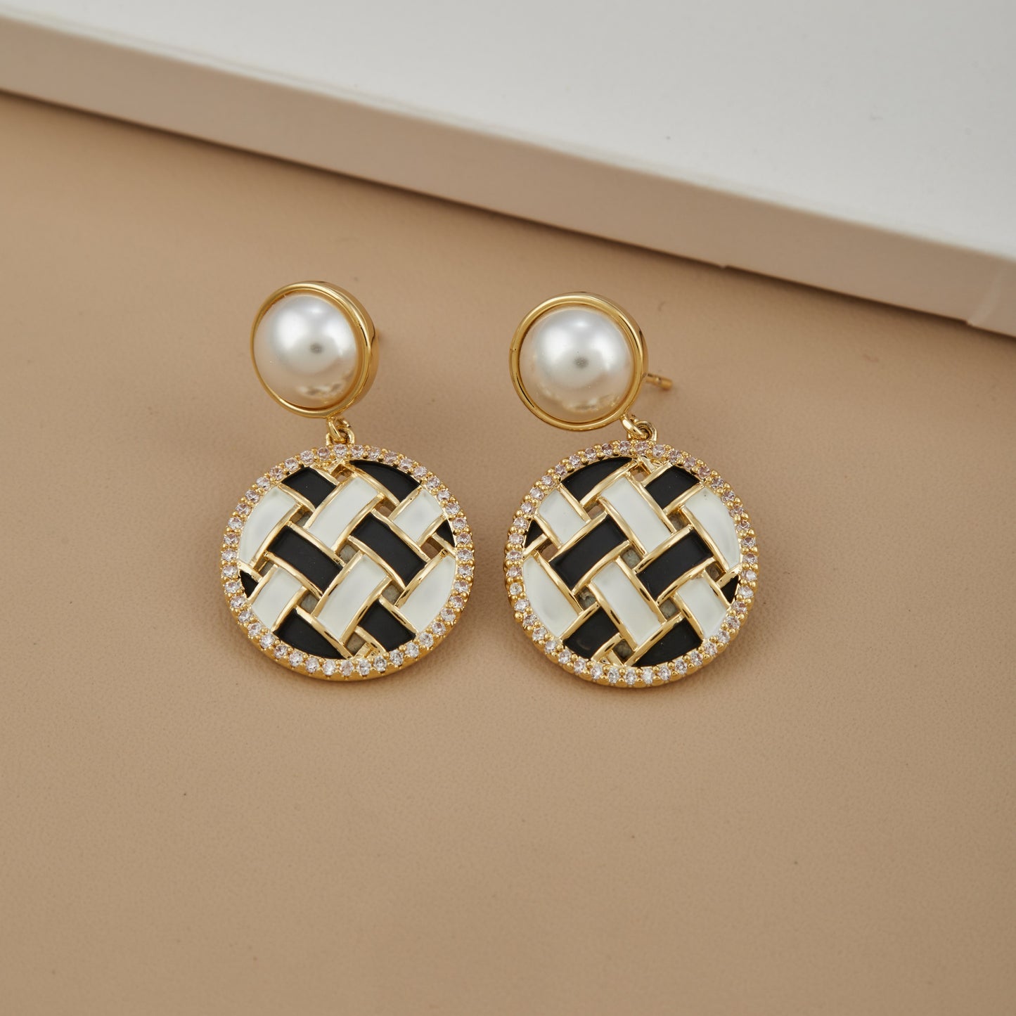 Artistic Enamel Earrings on Tan Display