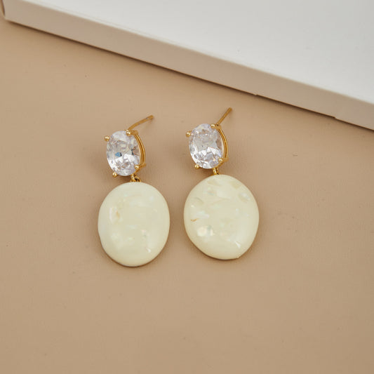 Elegant Gold Earrings with White Stone