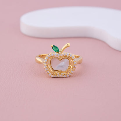 Gold Apple-Shaped Ring with CZ Halo and Green Leaf Accent