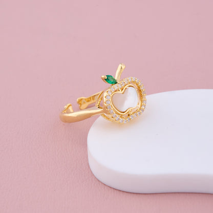 Gold Apple-Shaped Ring with CZ Halo and Green Leaf Accent