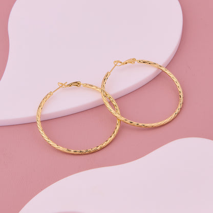 Golden Diamond-Cut Hoop Earrings
