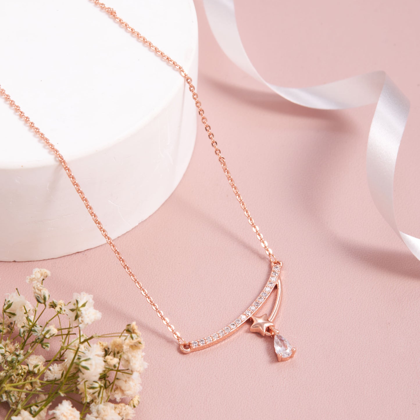 Elegant Rose Gold Pendant with Floral Accents