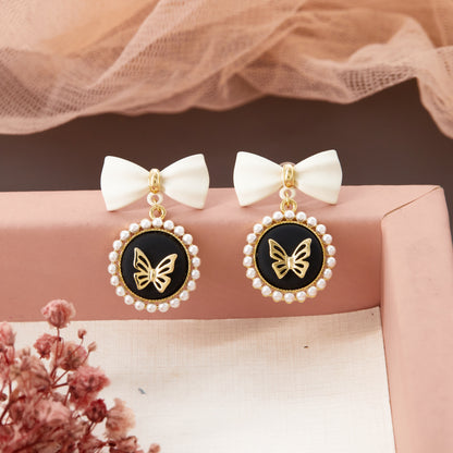 Bow & Butterfly Motif Earrings with Floral Accents