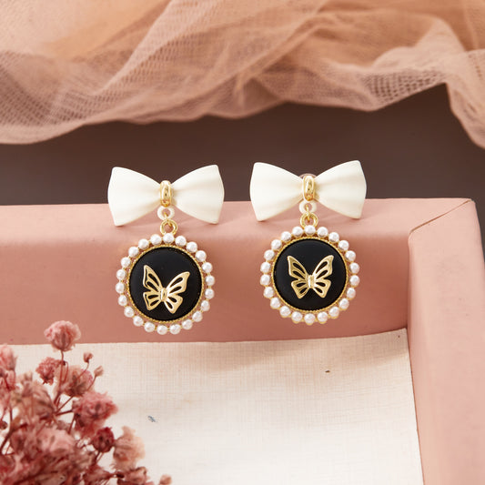 Bow & Butterfly Motif Earrings with Floral Accents
